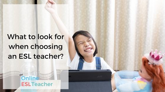 picture of a girl sat at a table in front of your laptop looking very happy and fist pumping the air