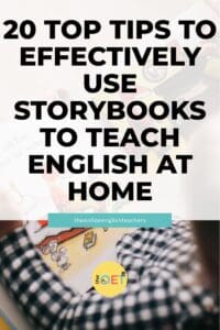 Text reads "20 top tips to effectively use storybooks to teach English at home" with a picture of a boy reading a picture book.