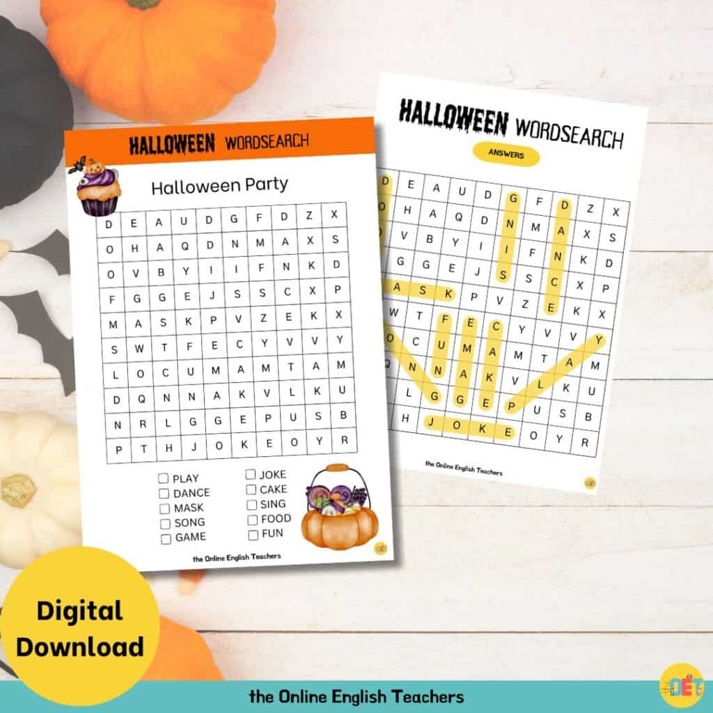 Image shows a flat lay halloween decorated table with a children's halloween wordsearch on top about a Halloween party.