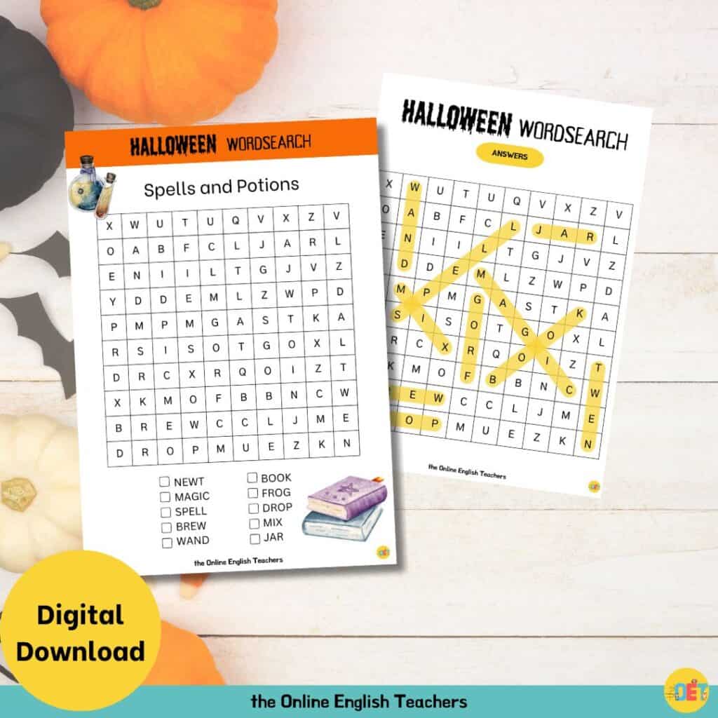 Image shows a flat lay halloween decorated table with a children's halloween wordsearch on top about spells and potions.